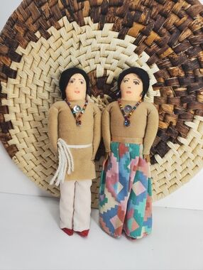 Vintage pair of hand crafted primitive Navajo tourist cloth dolls; man and woman